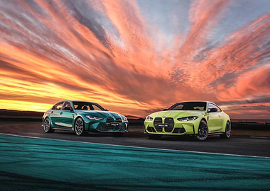 Two BMW M4 Cars at Sunset
