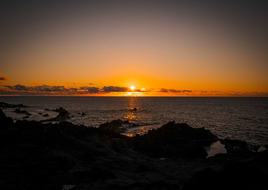 Ocean Sunset with Rocky Shoreline
