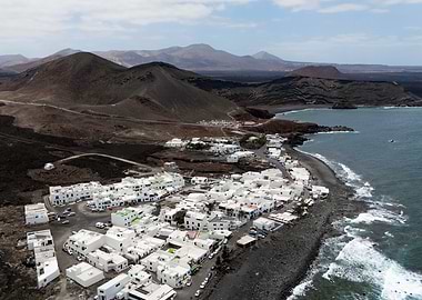 Coastal Village in Volcanic Landscape