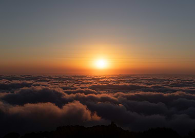 Sunset Above the Clouds