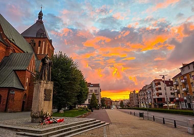 Gothic Cathedral in Koszalin and Statue of John Paul II at Sunset