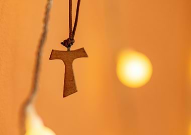 Tau Cross Pendant on Orange Background