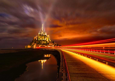 mont saint-michel at night with light trails