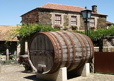 Large Wooden Barrel in Rural Setting