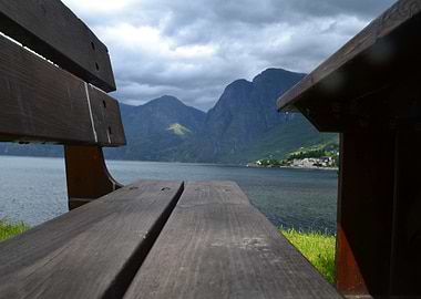 Bench Overlooking Lake and Mountains