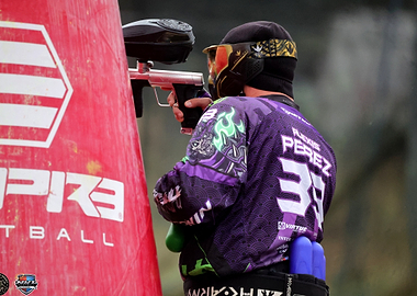 Paintball Player Aiming Gun