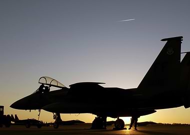 Silhouette of Fighter Jets at Sunset