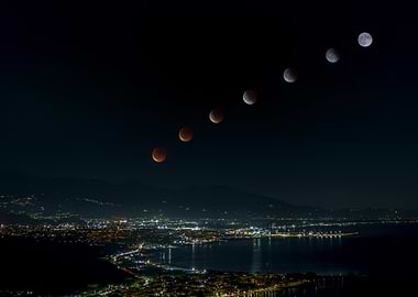 Lunar Eclipse Sequence Over Cityscape