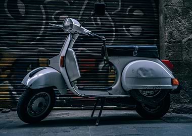Vintage Scooter Against Graffiti Wall