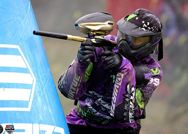 Paintball Player Aiming with Marker