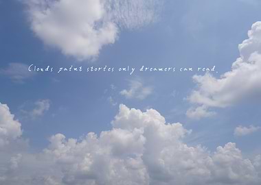 Soft clouds stretch across the horizon under a clear blue sky, creating a scene that feels like nature’s poetry in motion.