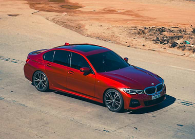 Red BMW on the road