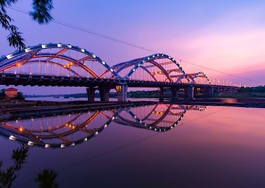 dragon bridge at dusk reflection