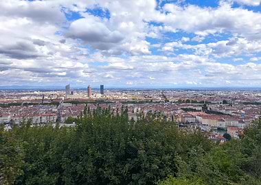 Lyon cityscape under a cloudy sky