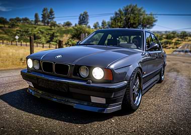 Gray BMW E34 on Country Road