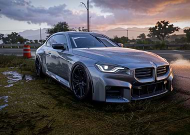 Silver BMW M2 on Wet Road