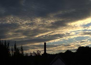 Dramatic Sky with Tower Silhouette