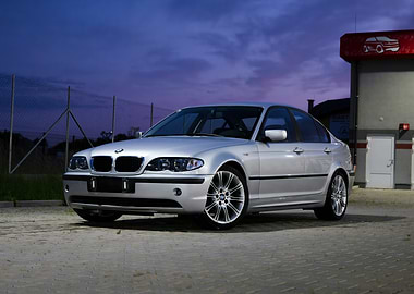 Silver BMW Sedan at Dusk