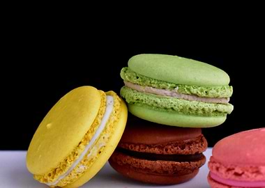 Colorful Macarons on White Surface