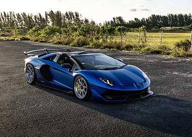 Blue Lamborghini Aventador on Asphalt