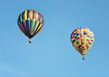 Two colorful hot air balloons