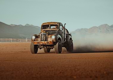 Vintage Truck Off-Roading in Desert Landscape