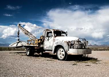 Vintage Tow Truck in Desert Landscape