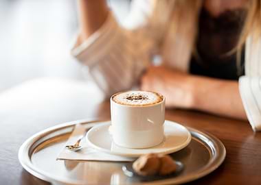 Cappuccino on a silver tray