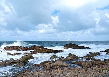 Ocean waves crashing on rocky shore