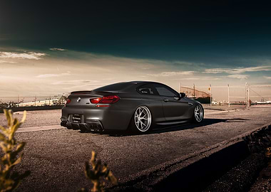 Gray BMW M6 Coupe on Asphalt