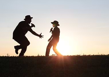 Silhouetted Singers at Sunset