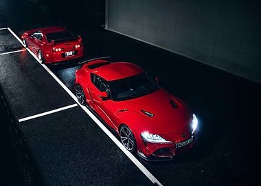Two Red Toyota Supra Cars