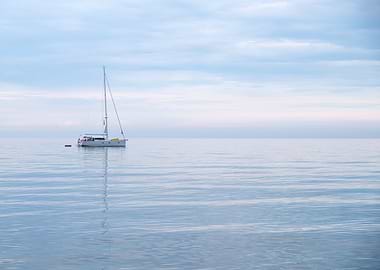 Sailboat on Calm Blue Water