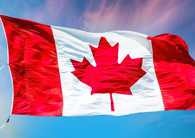 waving canadian flag against blue sky
