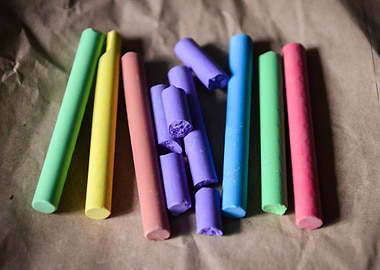 Colorful Chalk Sticks on Brown Paper