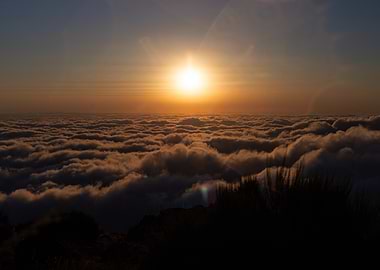 Sunrise Above a Sea of Clouds