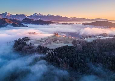 Church on Hill in Foggy Landscape