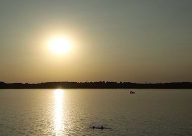 Sunset over a calm lake