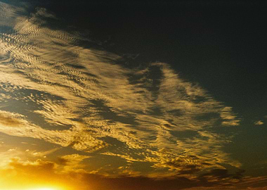 Golden Sunset Sky with Clouds
