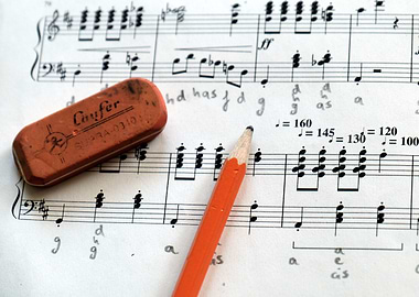 Music sheet with pencil and eraser