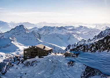 Mountain hut in snowy landscape