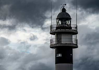 Lighthouse against a stormy sky