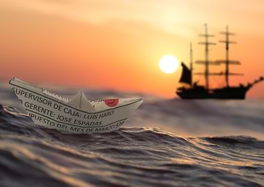 Paper Boat Sailing at Sunset