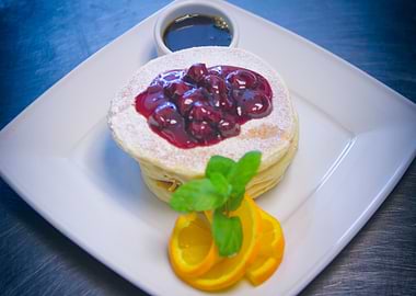 Pancakes with Cherry Topping and Orange with coffee