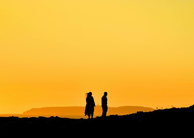 Silhouette of couple at sunset
