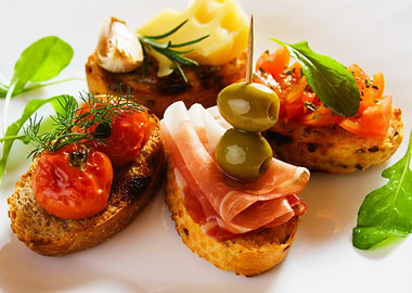 Assorted Bruschetta Appetizers on White Plate