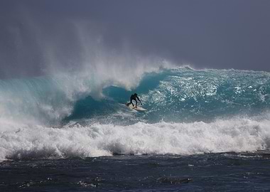 Surfer riding a big wave