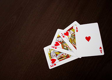 Royal Flush Hearts on Dark Wood