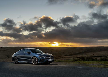 Blue Mercedes-Benz at Sunset