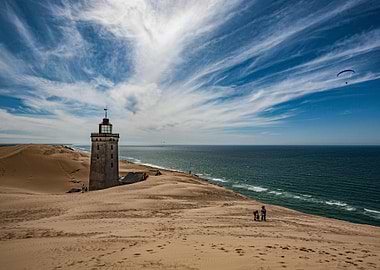 Lighthouse on Sand Dune by the Sea